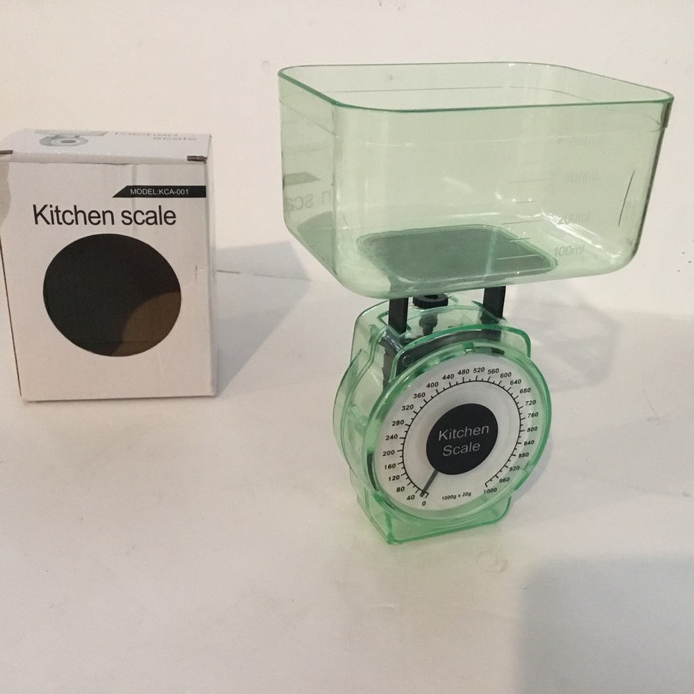 Kitchen scale. Plastic. 500 liquid ml capacity. New